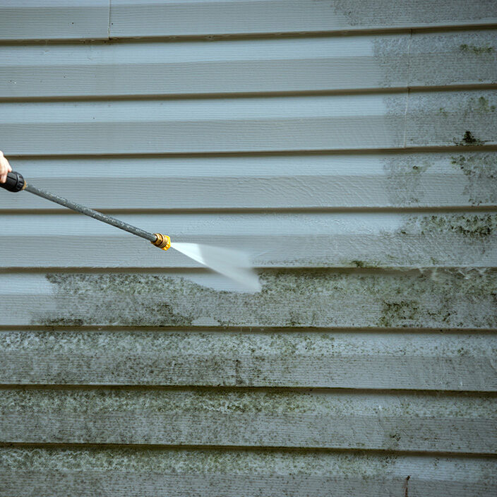 Pressure washing a house in Spokane, WA Pressure washing a house in Spokane, WA